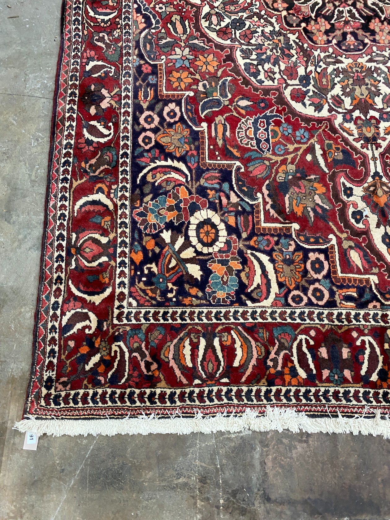 A Mahal burgundy ground carpet, 320 x 210cm